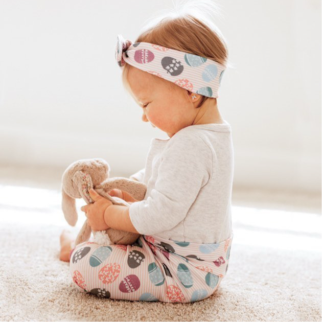 Easter eggs on Pink Stripes Leggings