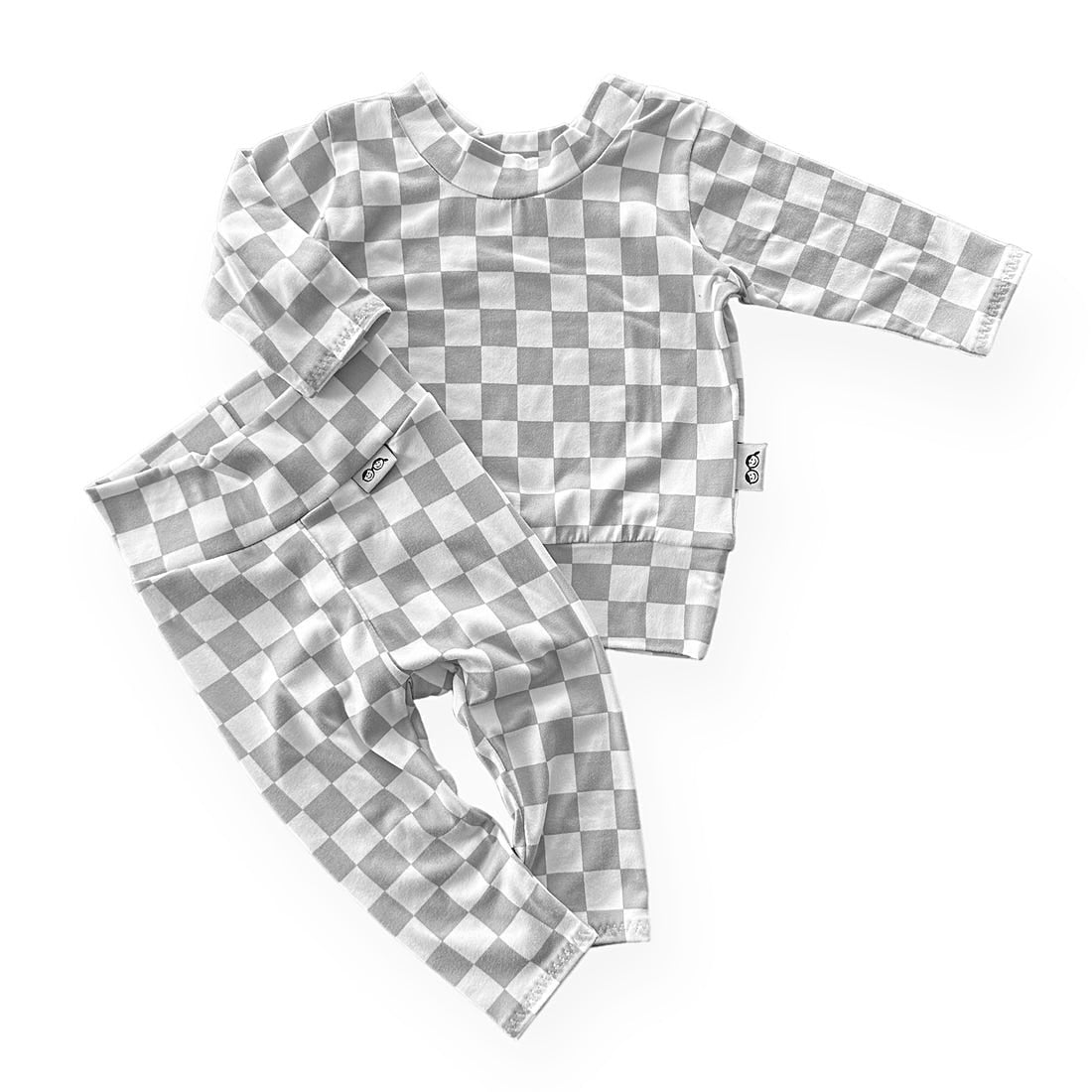 Gray and white checkered baby outfit on a white background