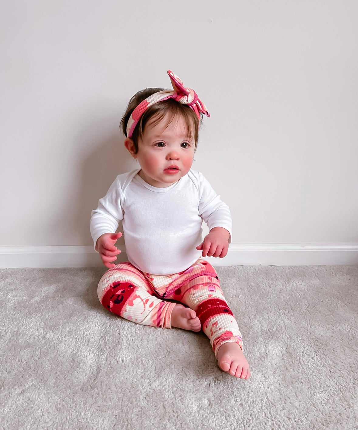 Baby Girl in Pink Abstract Stripe Ribbed Leggings