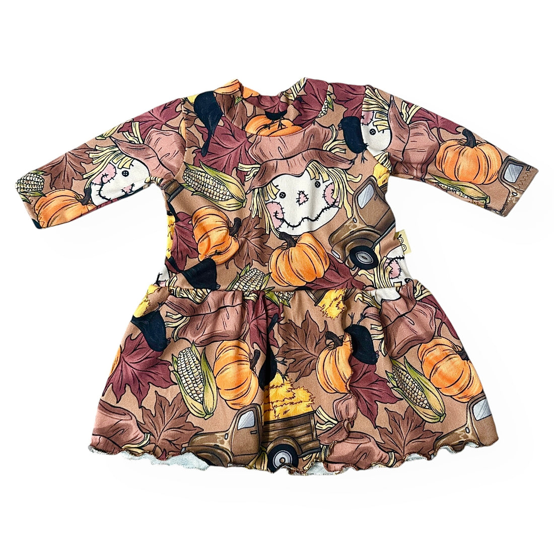Handmade baby and toddler fall dress with scarecrow, pumpkins, corn, and autumn leaves pattern – Harvest Scarecrow print by Dudis Design