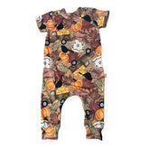 Halloween-themed baby romper with pumpkins, ghosts, and corn on a white background