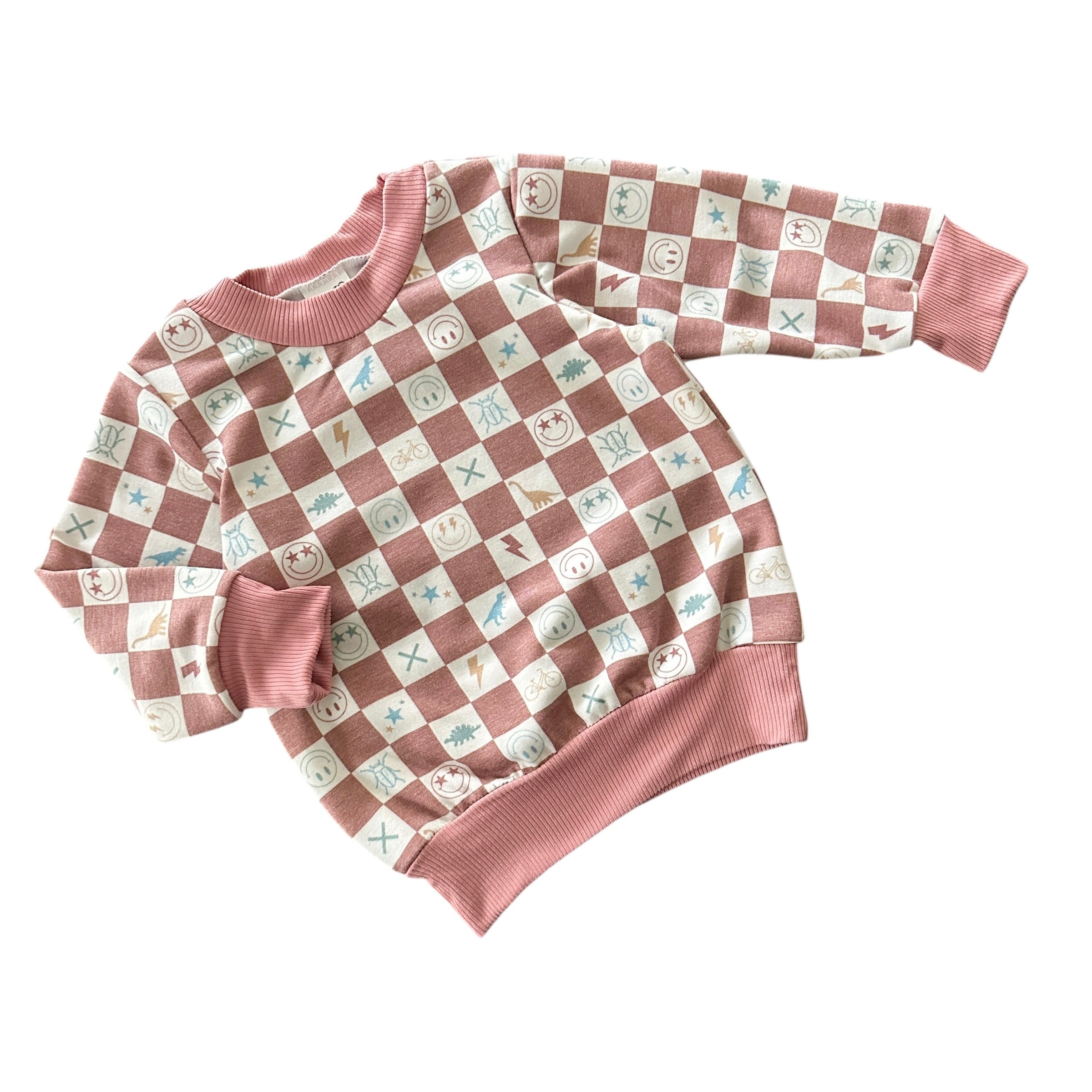 Mauve checker icons baby lounge pants displayed flat with smiley and doodle icons.