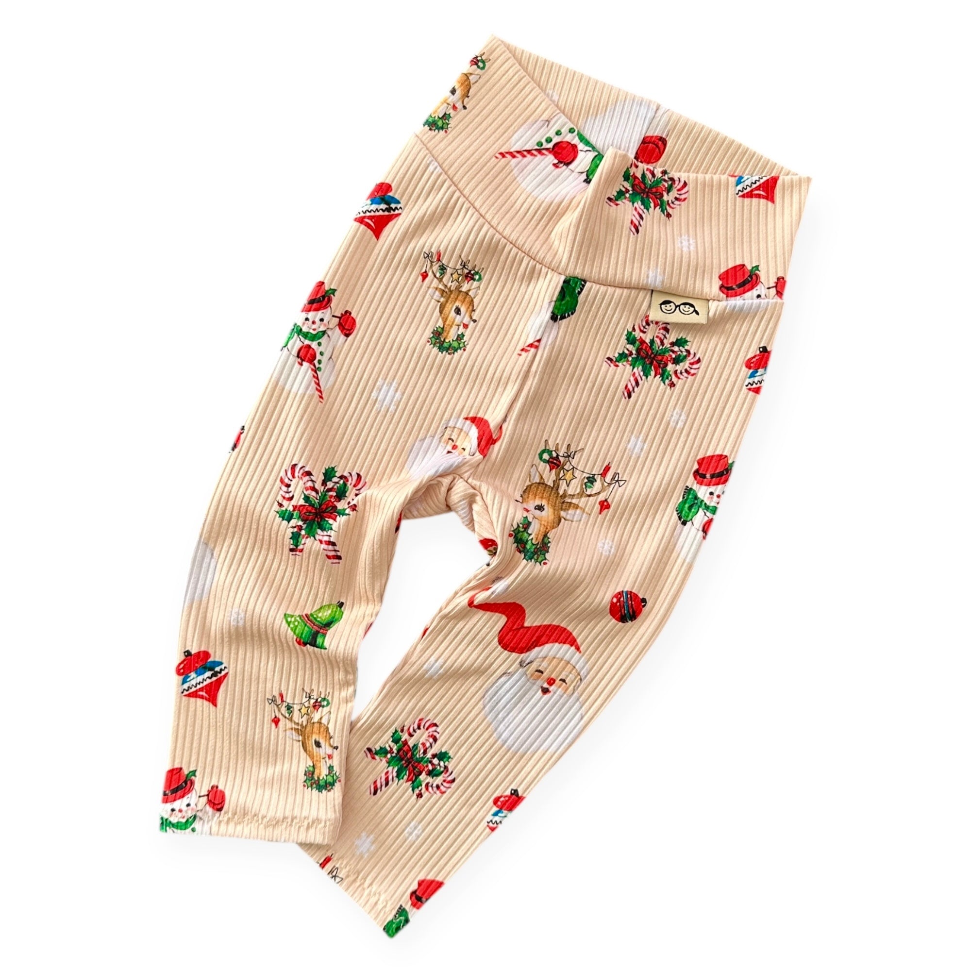 Vintage Christmas ribbed baby and toddler leggings with Santa, reindeer, and holiday prints — handmade soft winter outfit.