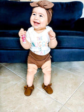 Happy Baby girl in Dudis Design Mocha Bummies