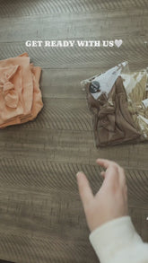 Toddler Girl in Mocha Leggings Getting Ready