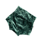 Green Velvet Bummies featuring a soft, high-waisted design. Handmade for babies and toddlers, perfect for holiday celebrations, special occasions, or everyday wear.