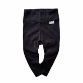Baby black ribbed leggings – soft, stretchy, and cozy for newborns, infants, and toddlers. Perfect for everyday wear, these gender-neutral pants offer comfort and style. Handmade with love, available in sizes preemie to 4T. Ideal for layering with sweaters, onesies, or tees. A must-have for trendy baby outfits!