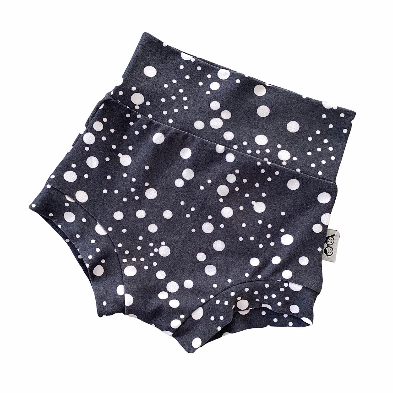 Handmade polka dot bummies for babies and toddlers, featuring a stylish black and white design. Soft, comfortable, and perfect as a diaper cover or for everyday wear. Ideal for active little ones and special occasions alike.