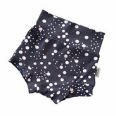 Handmade polka dot bummies for babies and toddlers, featuring a stylish black and white design. Soft, comfortable, and perfect as a diaper cover or for everyday wear. Ideal for active little ones and special occasions alike.
