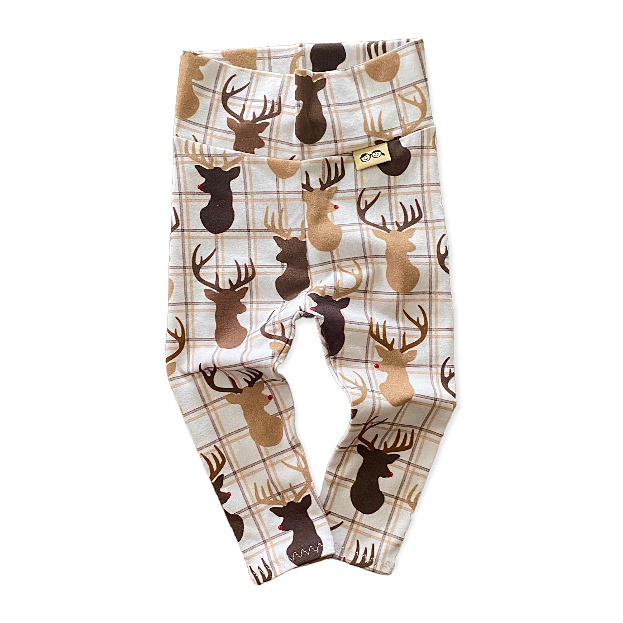 Handmade reindeer plaid lounge set for babies and toddlers, featuring a cozy long-sleeve top and matching leggings. Perfect holiday outfit.