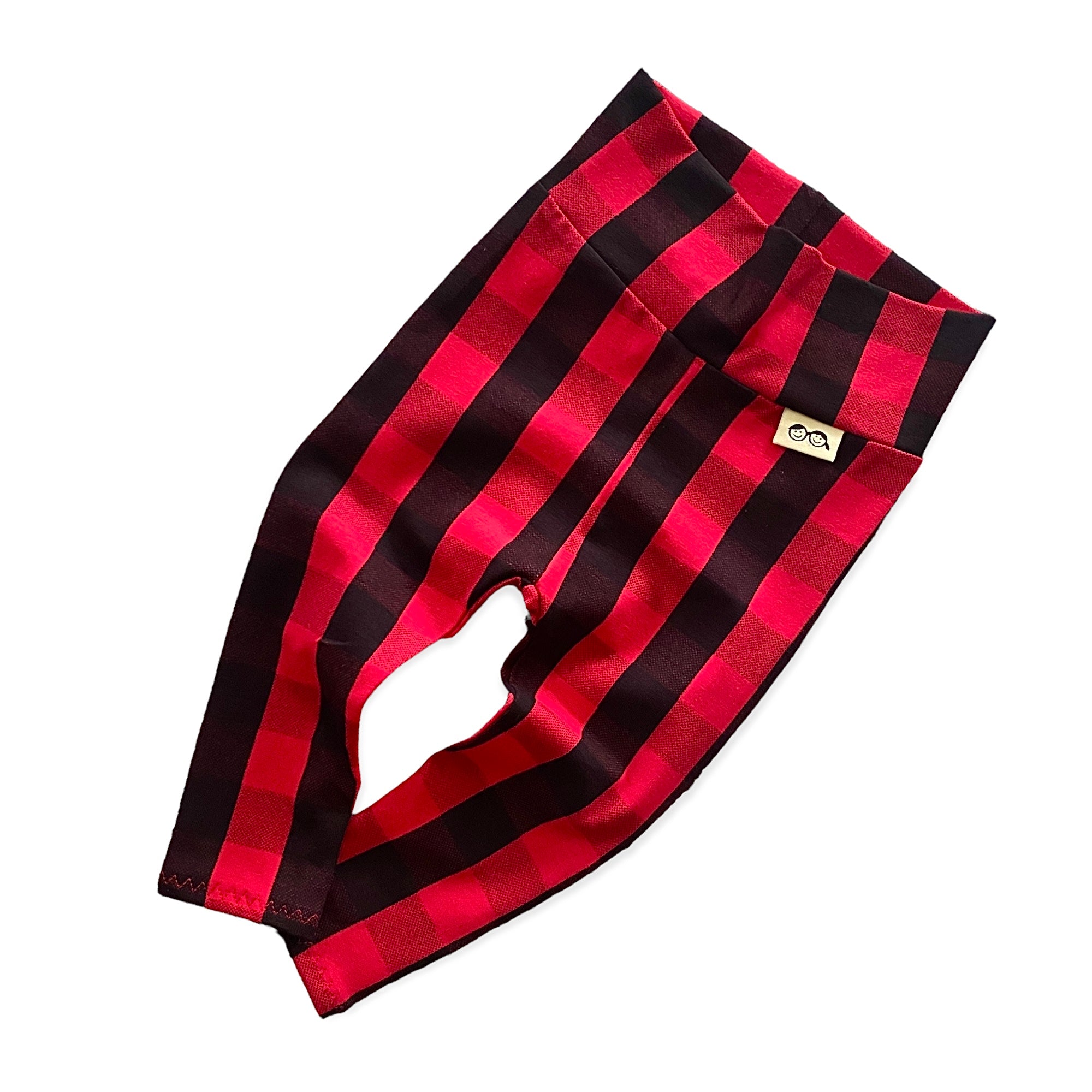 Cozy red buffalo plaid lounge set for kids, featuring a long-sleeve top and matching leggings, perfect for holiday style and comfort.