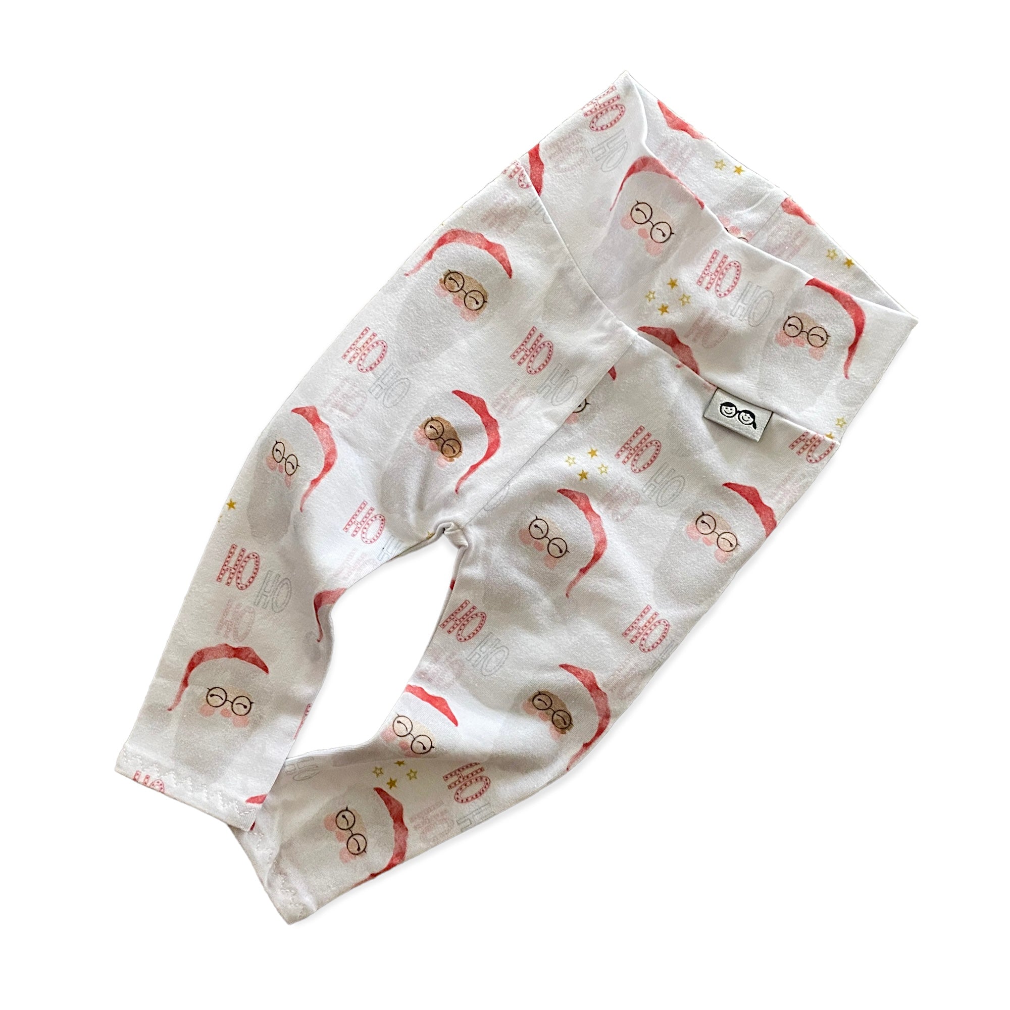 Vintage Santa Lounge Set featuring a festive Santa Claus print, includes a long-sleeve top and matching leggings. Handmade for babies and toddlers, perfect for holiday photos, Christmas morning, and seasonal celebrations.