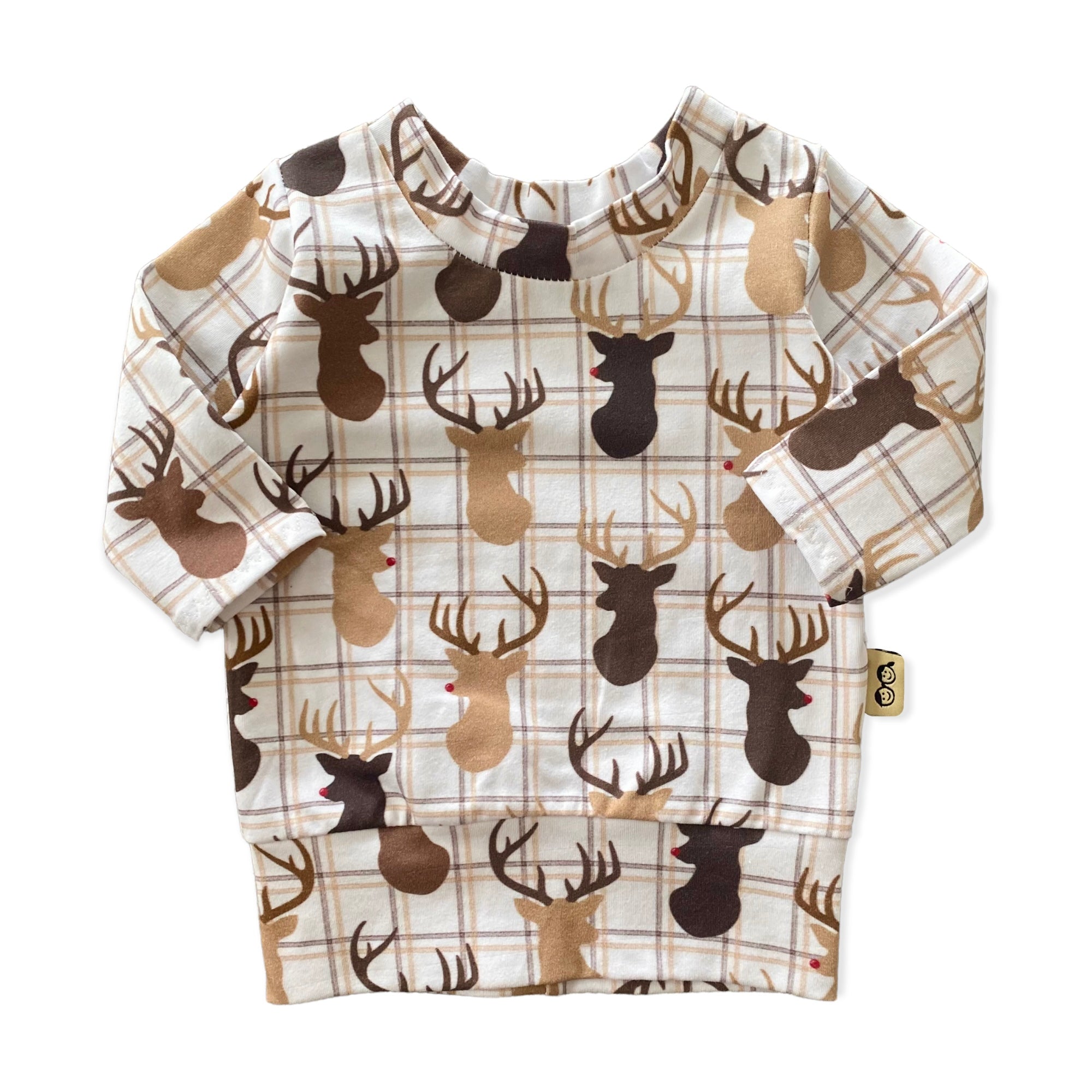 Handmade reindeer plaid long-sleeve top for babies and toddlers, featuring festive holiday designs in neutral tones. Cozy and stylish for winter.