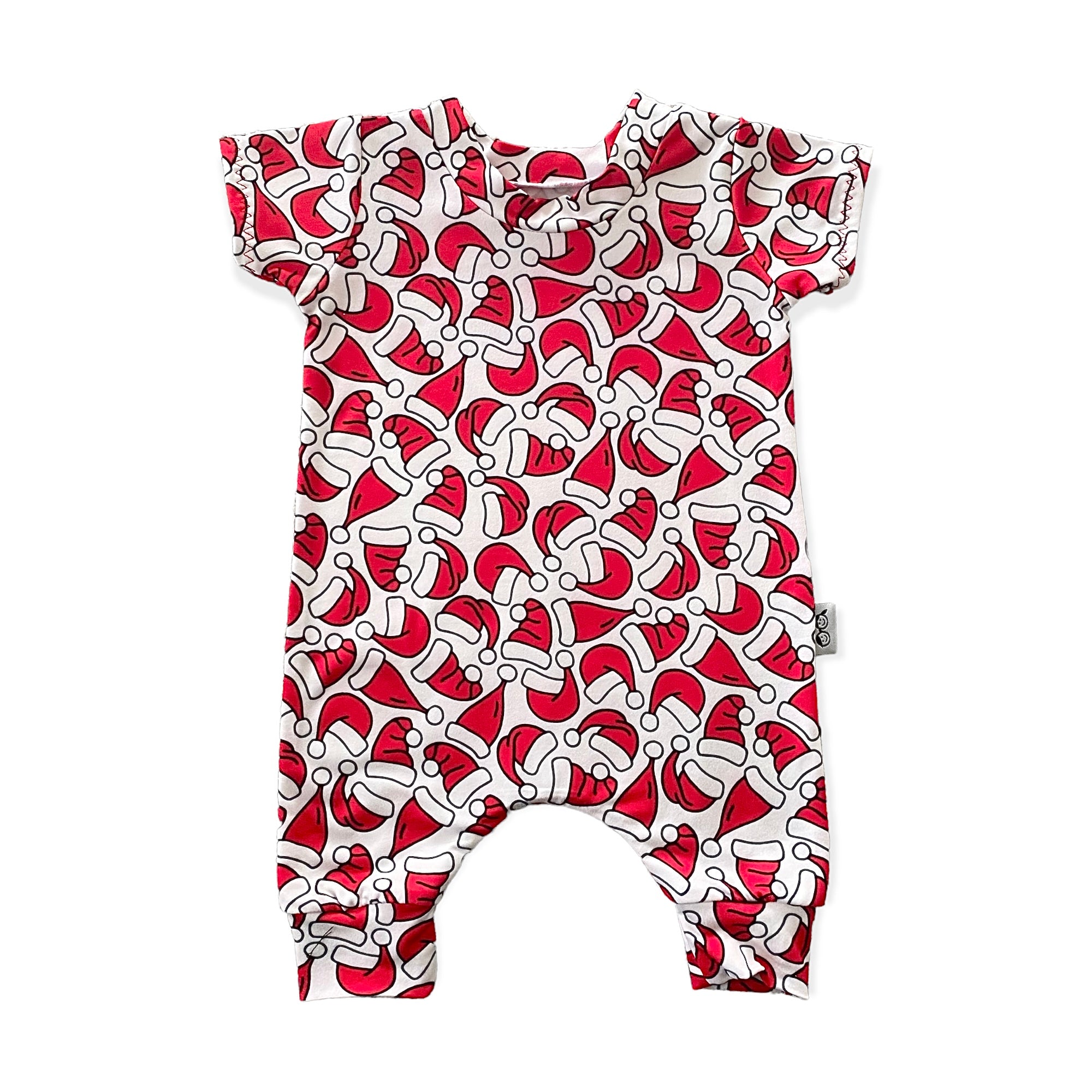 Festive baby romper with vibrant red and white Santa hat print, perfect for holiday celebrations. Available in sizes newborn to 4T.