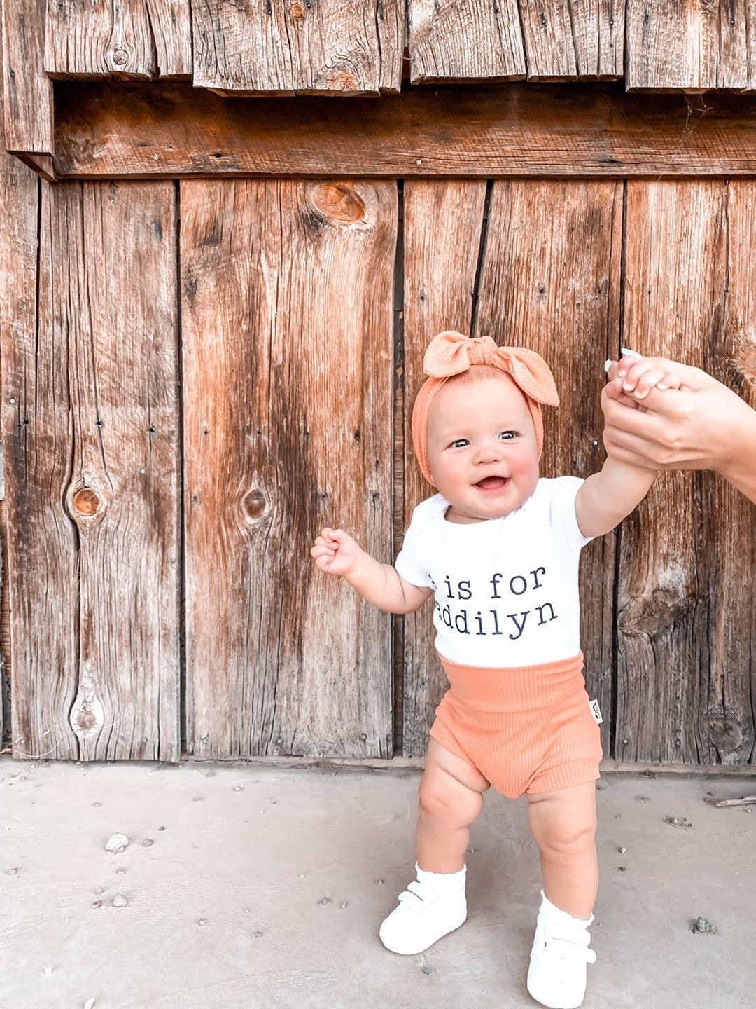 Baby Girl in Melon Ribbed Bummies