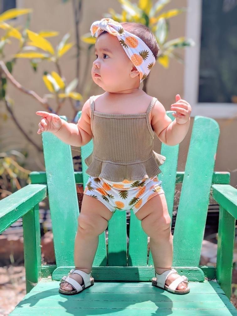 Baby Girl in Pineapple Bummies