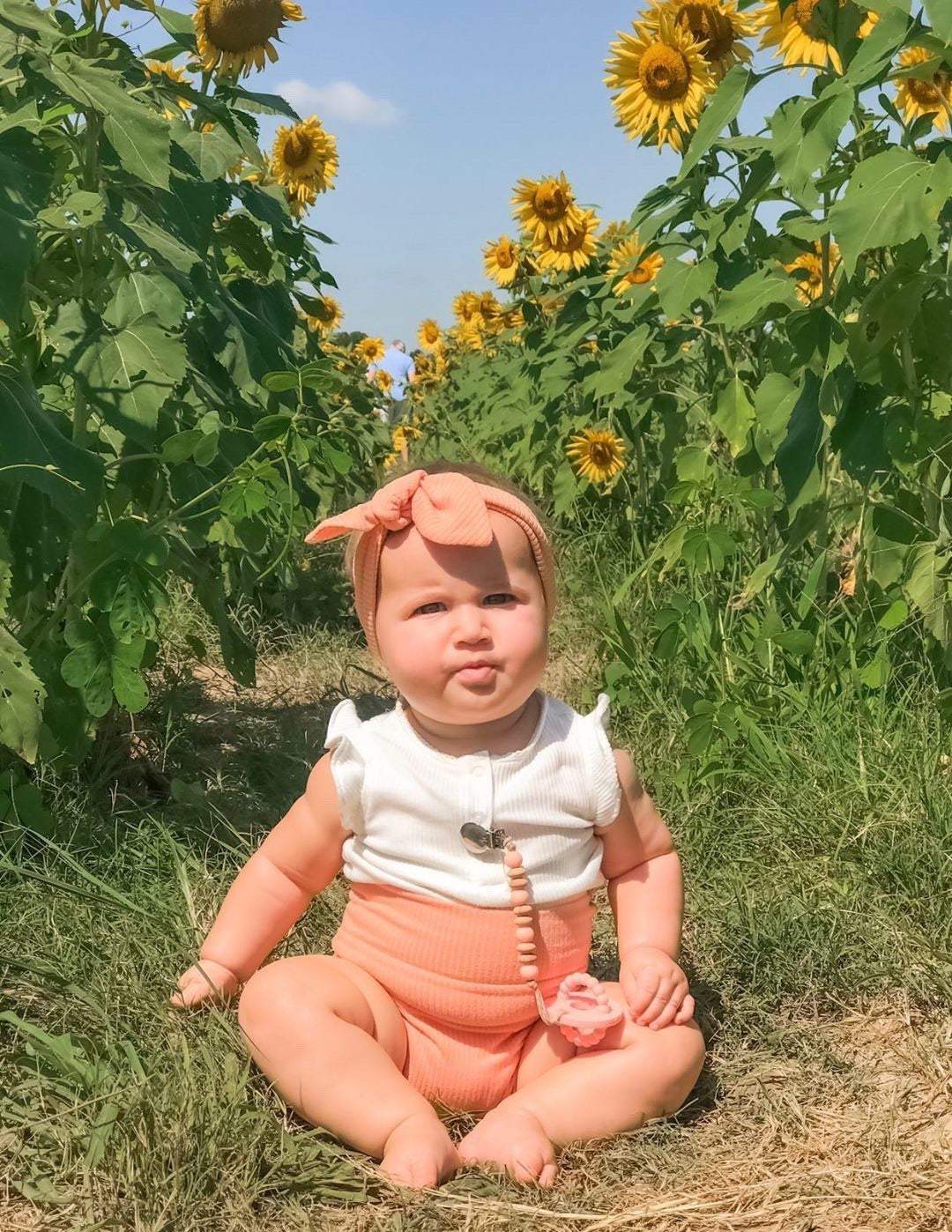 Baby Girl in Melon Ribbed Bummies