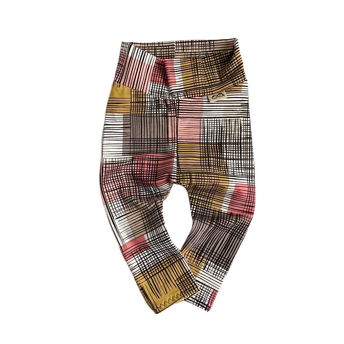 Flat-lay of Retro Plaid Leggings featuring a colorful and vibrant plaid pattern with a wide waistband for comfort.