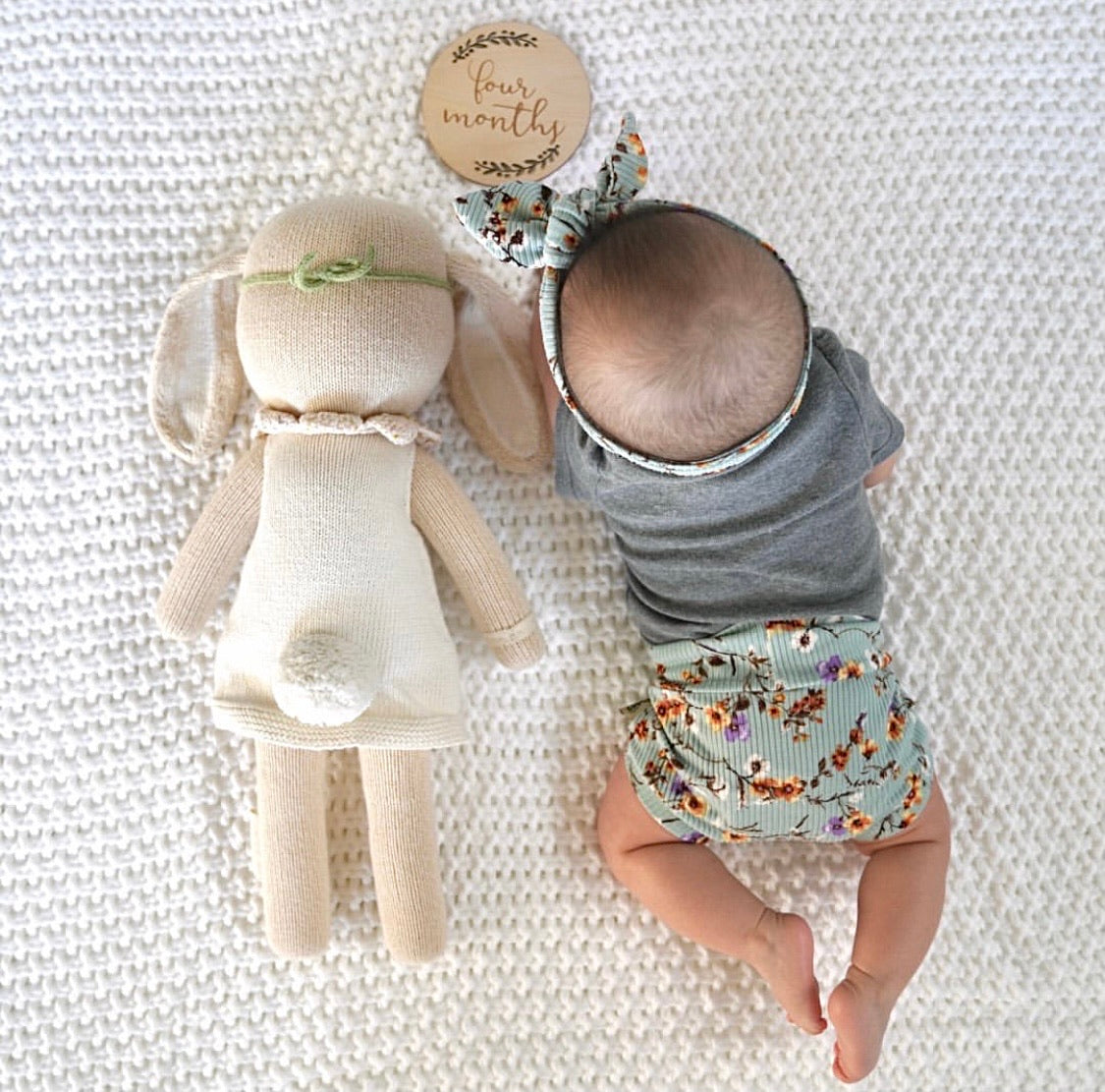 Baby Girl Wearing Dried Floral on Sage Ribbed Bummies