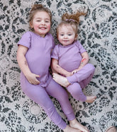 Siblings in Lavender Ribbed Harem Romper