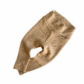 Beige baby leggings with a brand logo on a white background