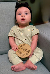 Baby holding a &
