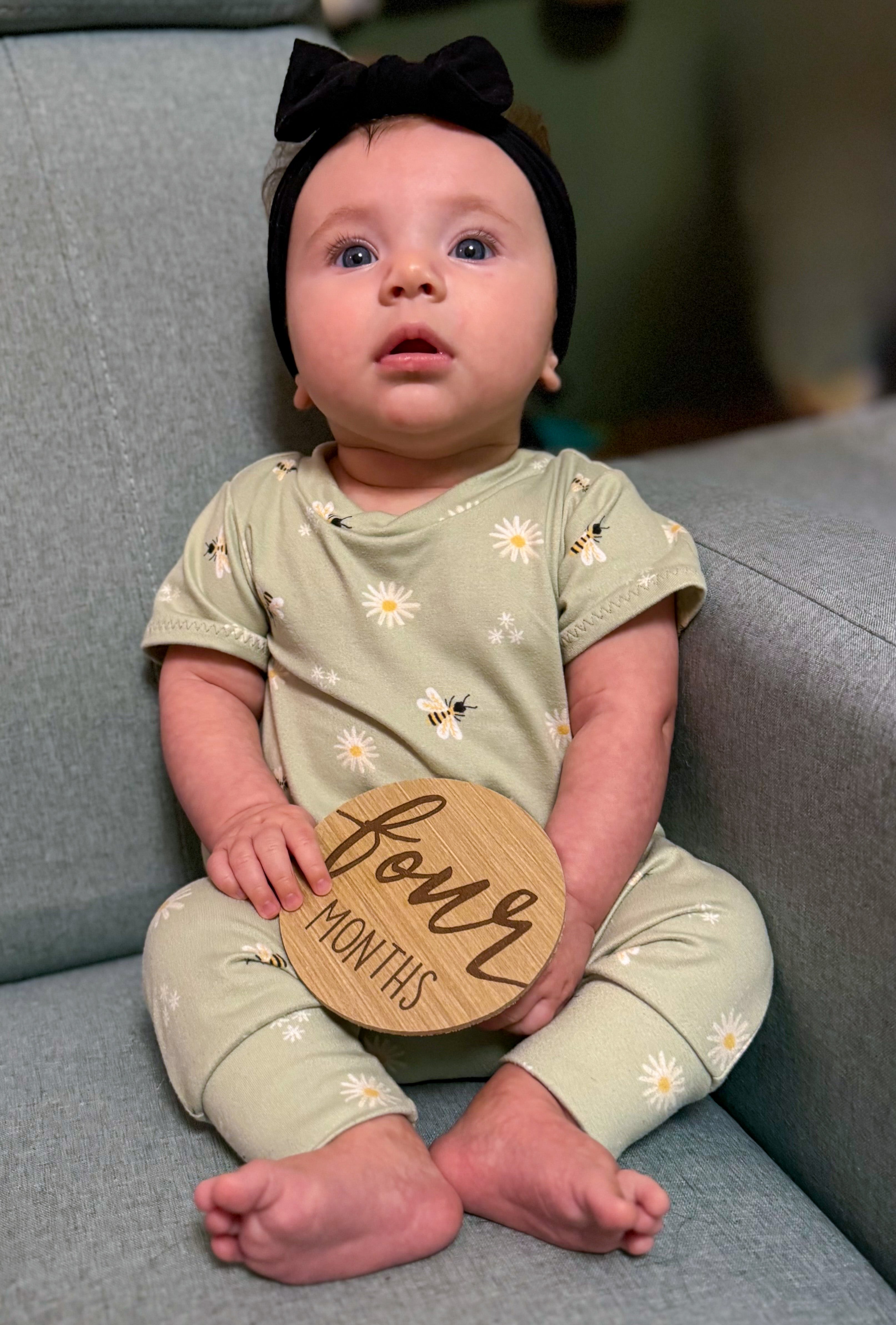 Baby holding a &