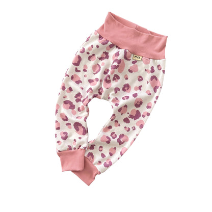Blush and mauve leopard print baby lounge pants with stretchy pink waistband and cuffed ankles, soft handmade baby bottoms.