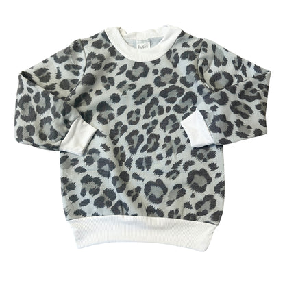 Unisex grey leopard baby sweatshirt with white ribbed trim, soft handmade toddler top in neutral animal print.