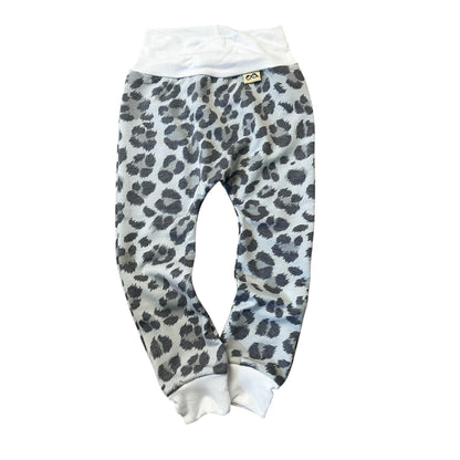 Grey leopard baby harem pants with white ribbed waistband and cuffs, handmade neutral baby clothing.