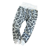 Grey leopard print baby lounge pants with soft stretch belly waistband and cuffed ankles, unisex handmade baby pants.