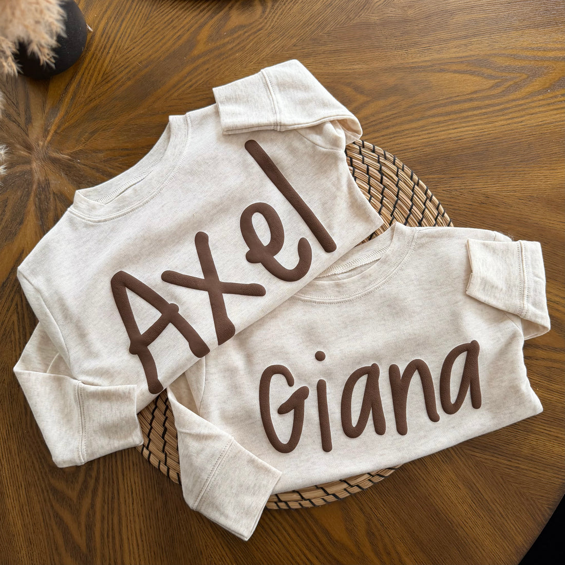 Two beige sweatshirts with names &