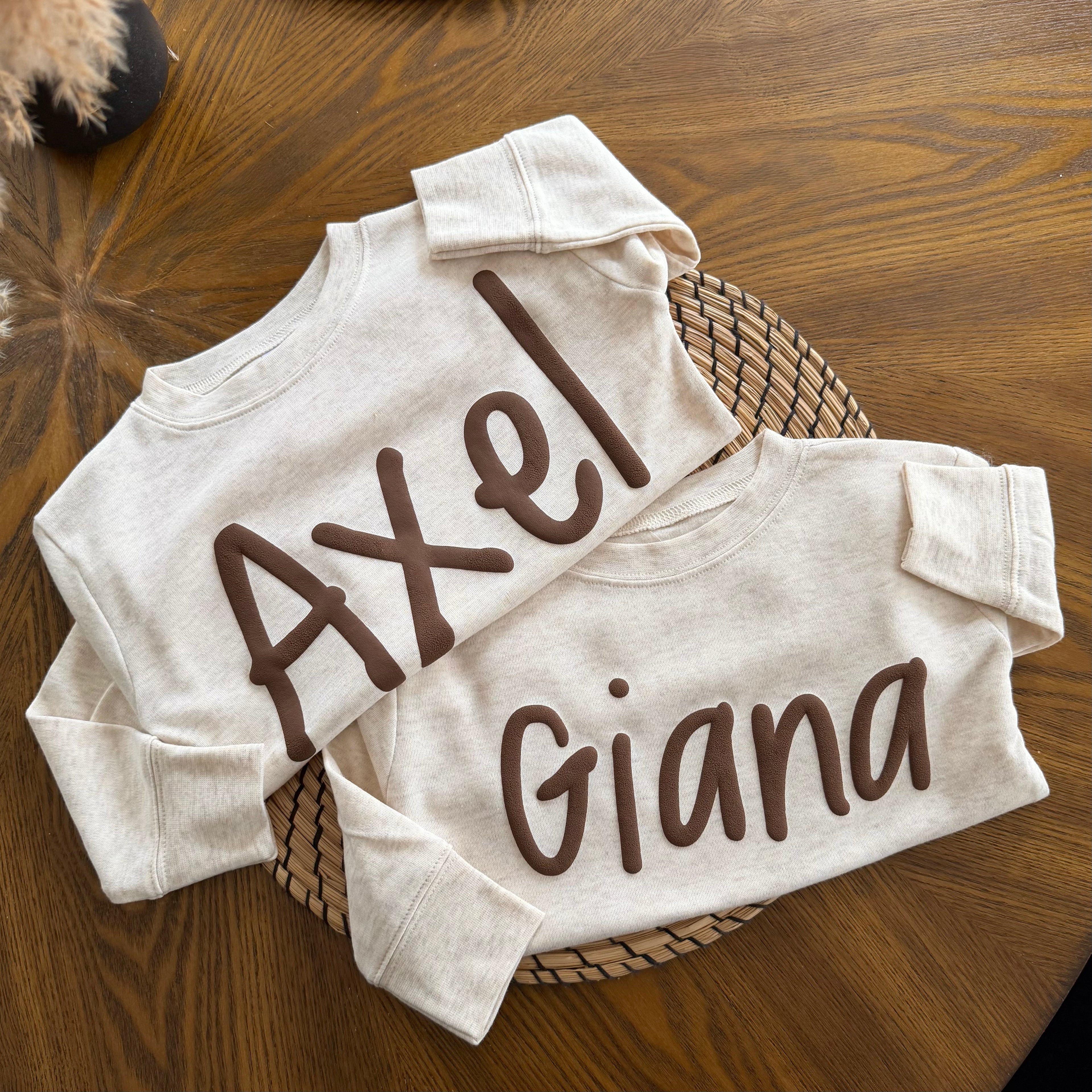 Two beige sweatshirts with names &