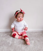 Baby Girl in Pink Abstract Stripe Ribbed Leggings