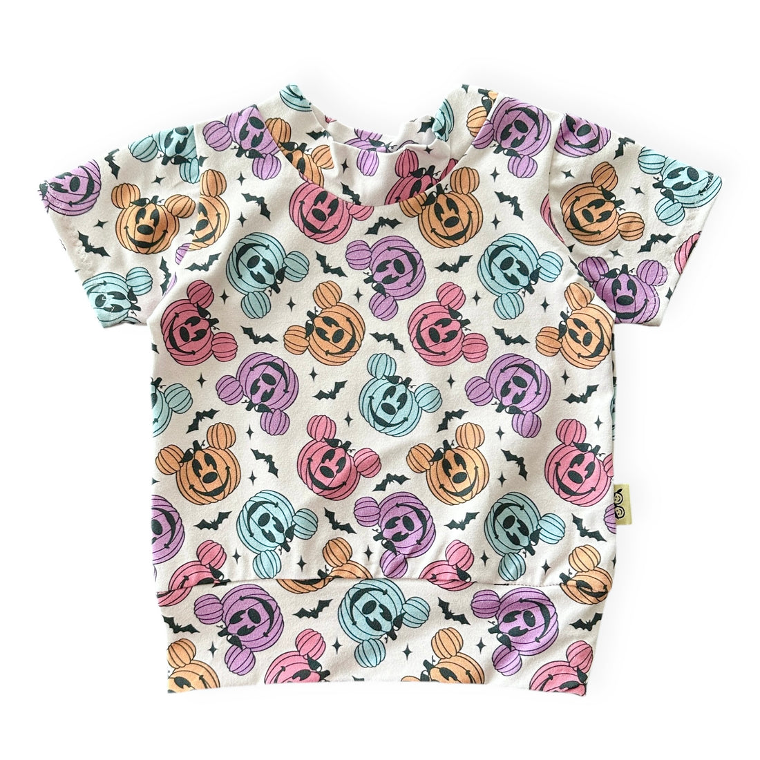 Baby short sleeve top with Halloween-themed pattern on a white background