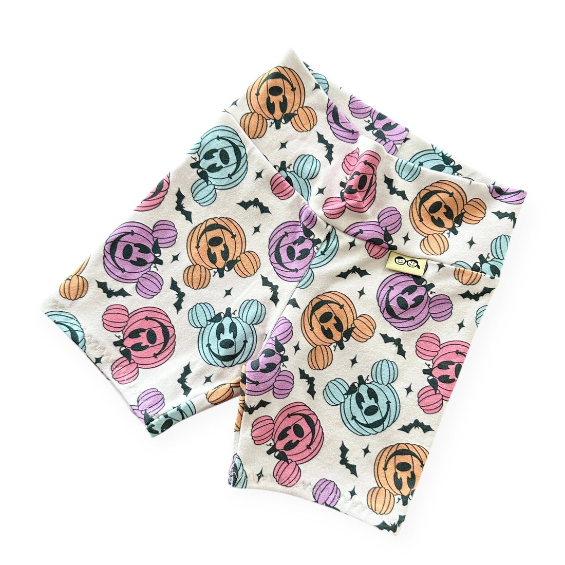 Baby Biker Shorts with Halloween-themed designs on a white background