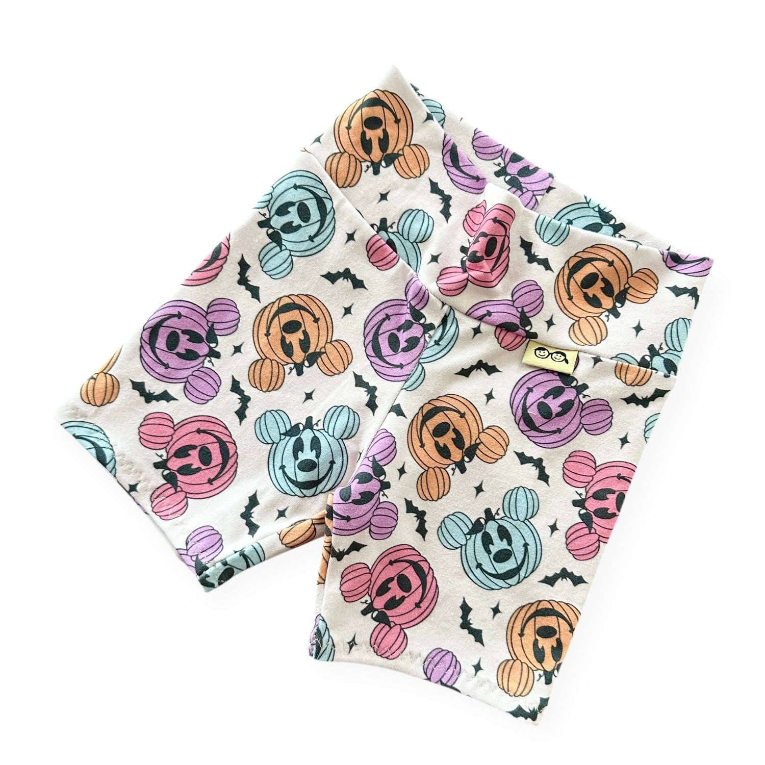 Baby Biker Shorts with Halloween-themed designs on a white background