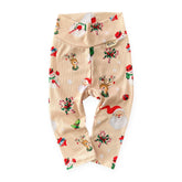 Vintage Christmas ribbed baby and toddler leggings with Santa, reindeer, and holiday prints — handmade soft winter outfit.