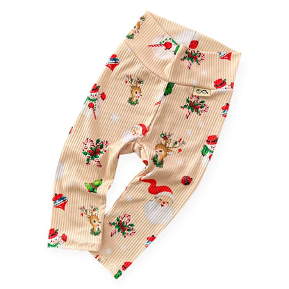 Vintage Christmas ribbed baby and toddler leggings with Santa, reindeer, and holiday prints — handmade soft winter outfit.