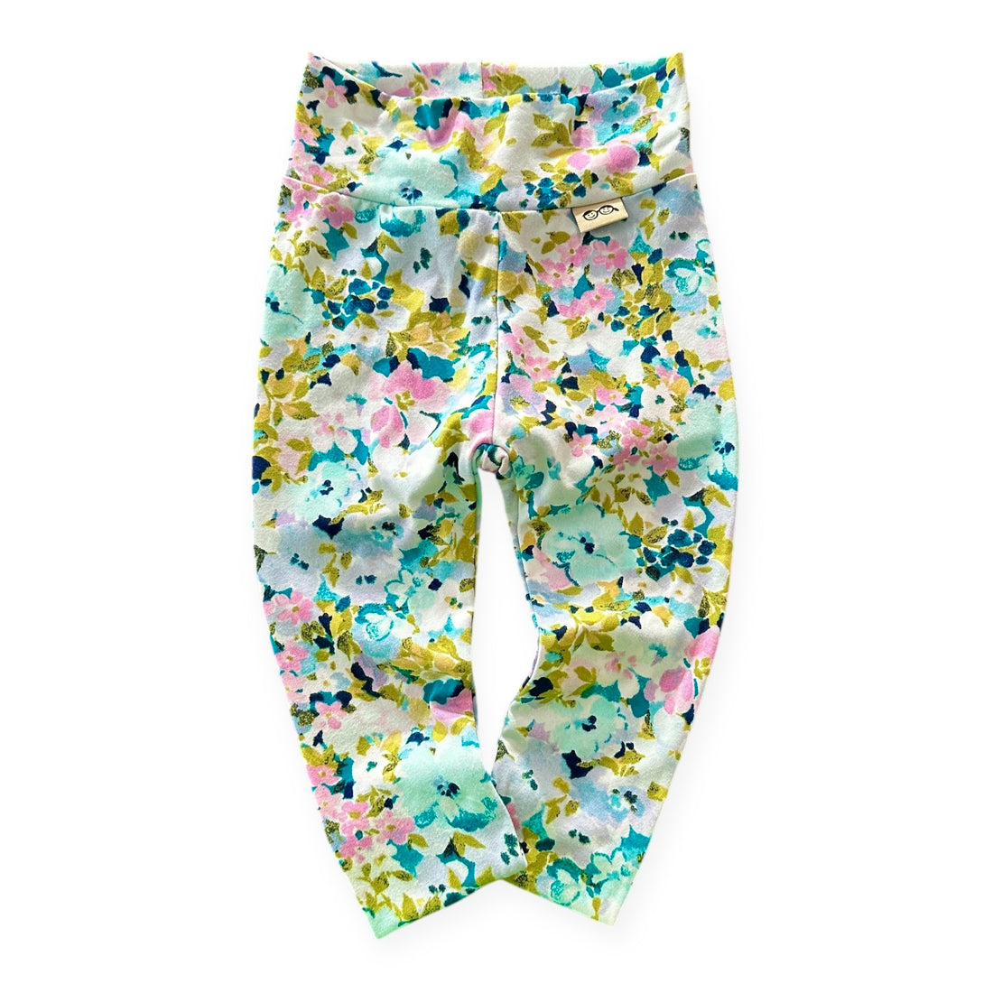 Floral patterned pants on a white background