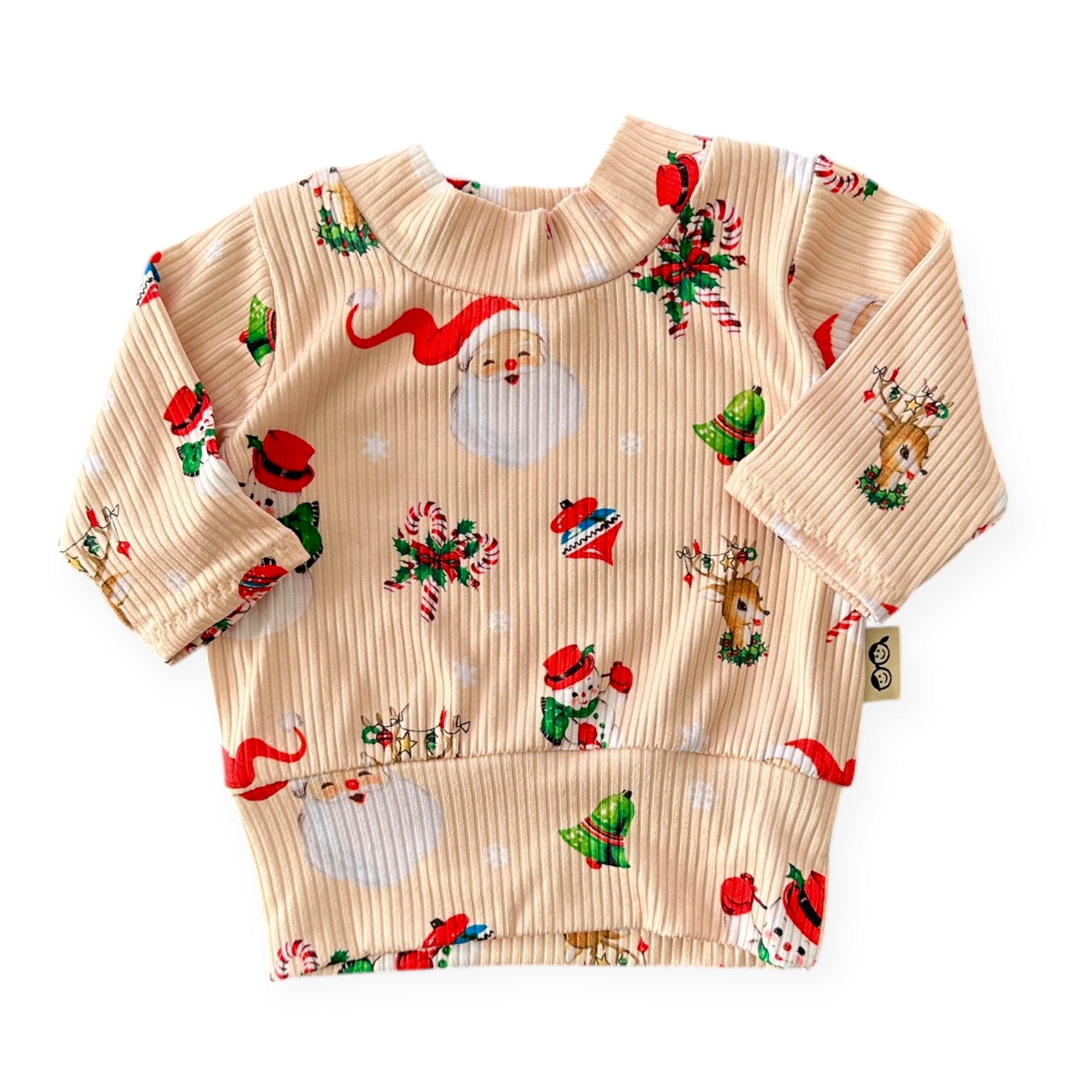 Retro-style Christmas ribbed baby top with Santa, reindeer, and wreath print – handmade holiday outfit.