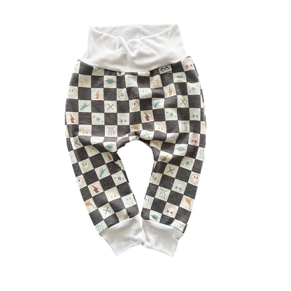 Charcoal checker smiley icons baby lounge pants with soft white waistband.