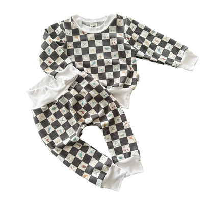 Flat lay of charcoal checker icon lounge set with top and pants.