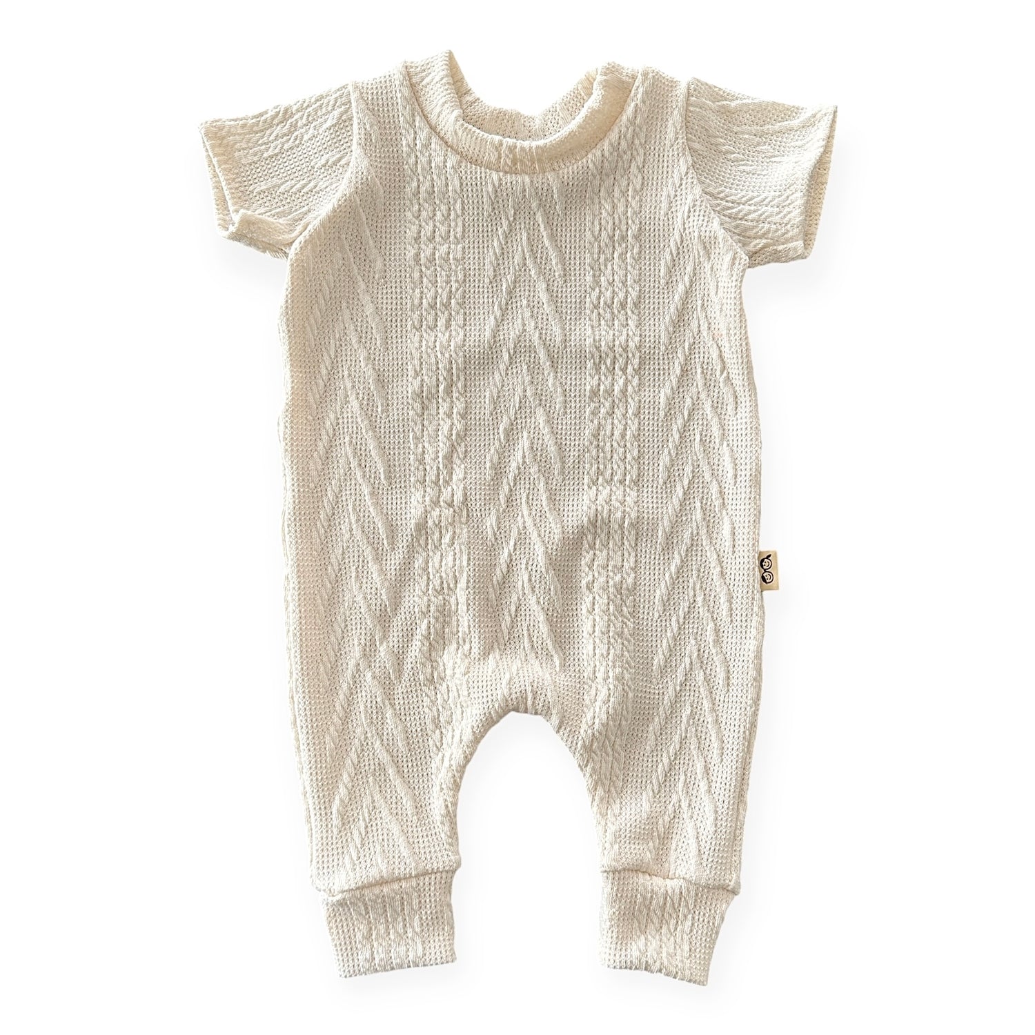 Knitted baby romper on a white background