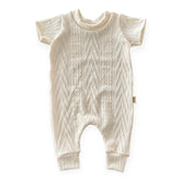 Knitted baby romper on a white background