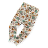 Cozy rib knit baby leggings with outdoor s’mores and camper print.