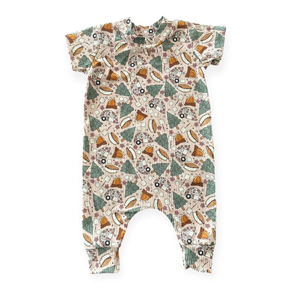 Handmade baby romper in Campfire &amp; S’mores Adventures print with campers and campfires.