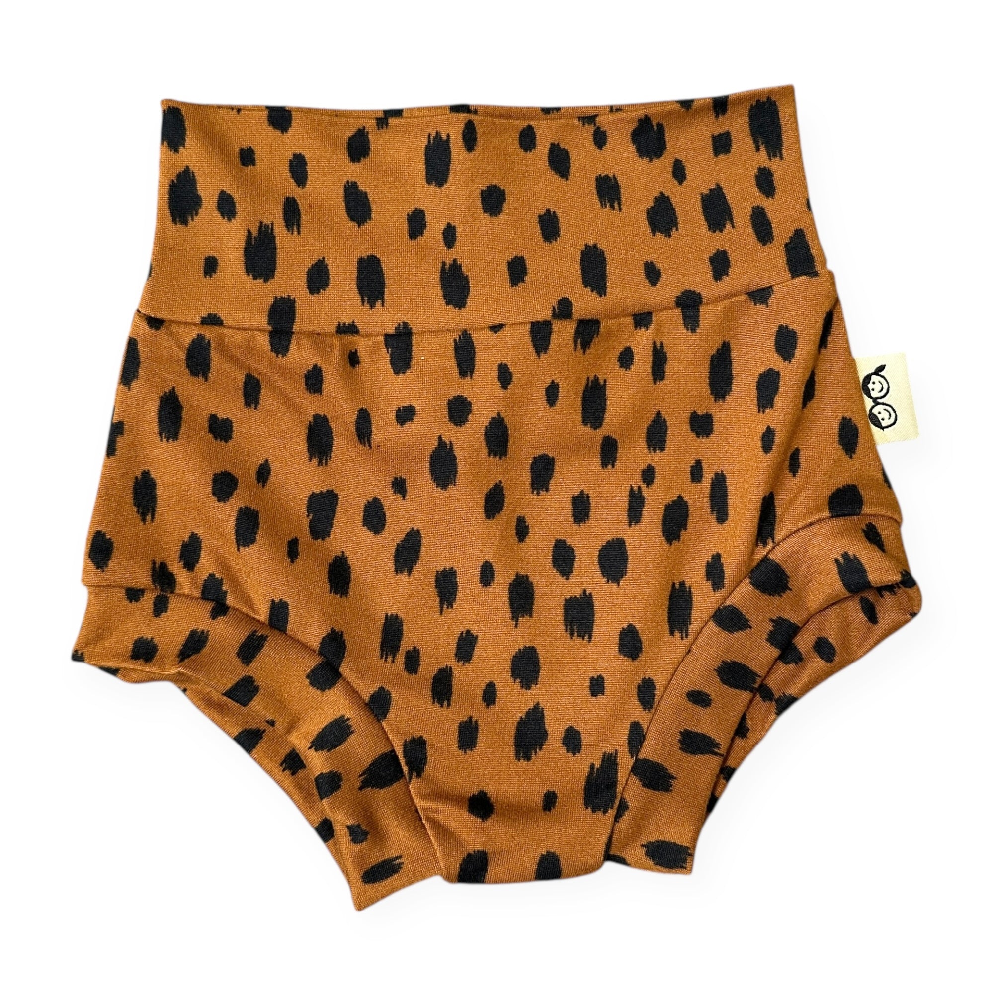 Brown diaper cover with black spotted pattern on a white background