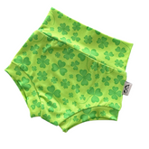 Green shamrock baby bummies with a high-waisted design, perfect for St. Patrick’s Day celebrations. These soft and stretchy diaper covers are ideal for newborns, infants, and toddlers, offering comfort and style for festive outfits or everyday wear.