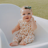 Baby wearing Taupe Cream Rib Harem Romper